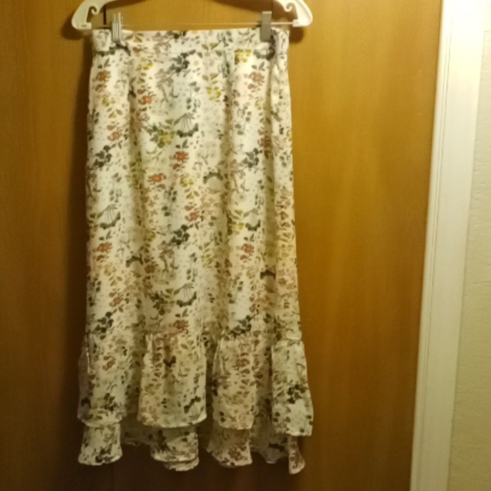 Floral skirt W 15" to 16" L 32" ruffled hem lined